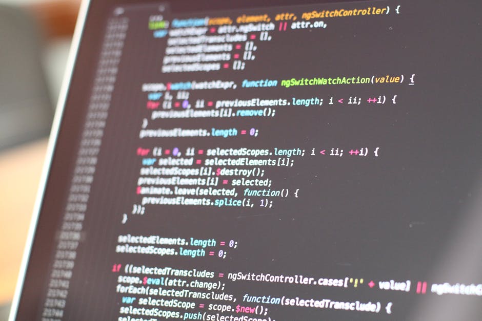 A close-up view of a computer screen displaying lines of colorful programming code, with syntax highlighted in various shades of pink, blue, green, and white. The code appears to be JavaScript, featur